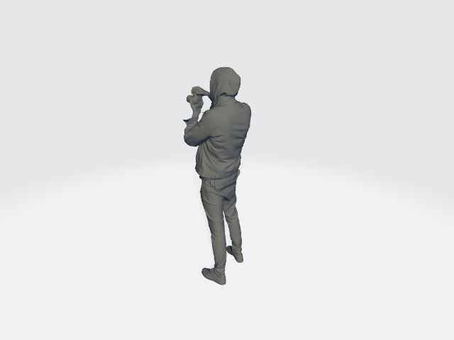 Young Male With Camera Focusing Figure