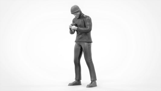 Male In Beanie Cap Checking Camera Figure